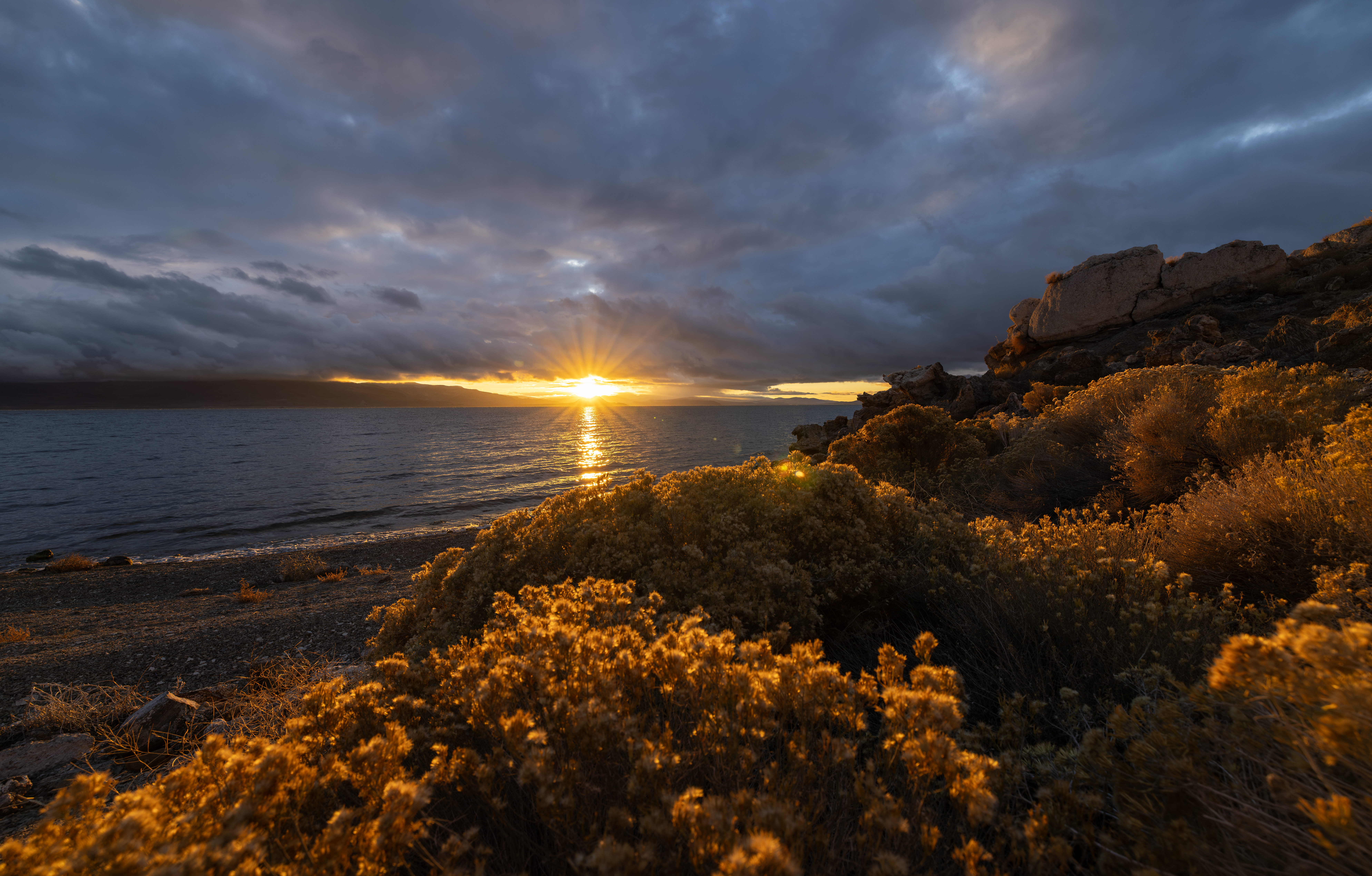 The sun rises over the distinctive rock formations of Pyramid Lake in Nevada.