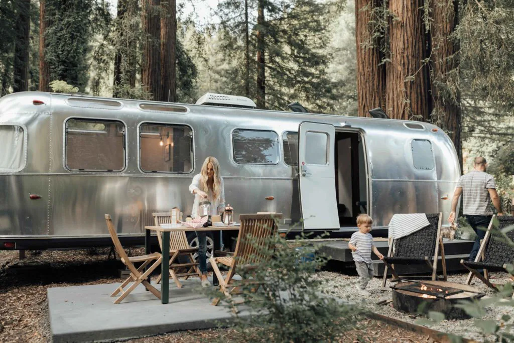 Modern Airstream trailer at AutoCamp with a private outdoor seating area.