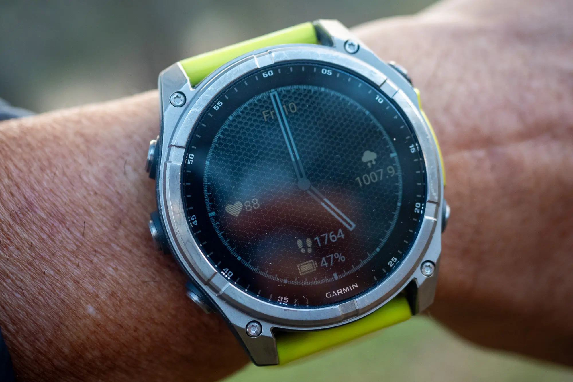 Garmin fenix 8 Solar Sapphire showing the watch face and titanium bezel