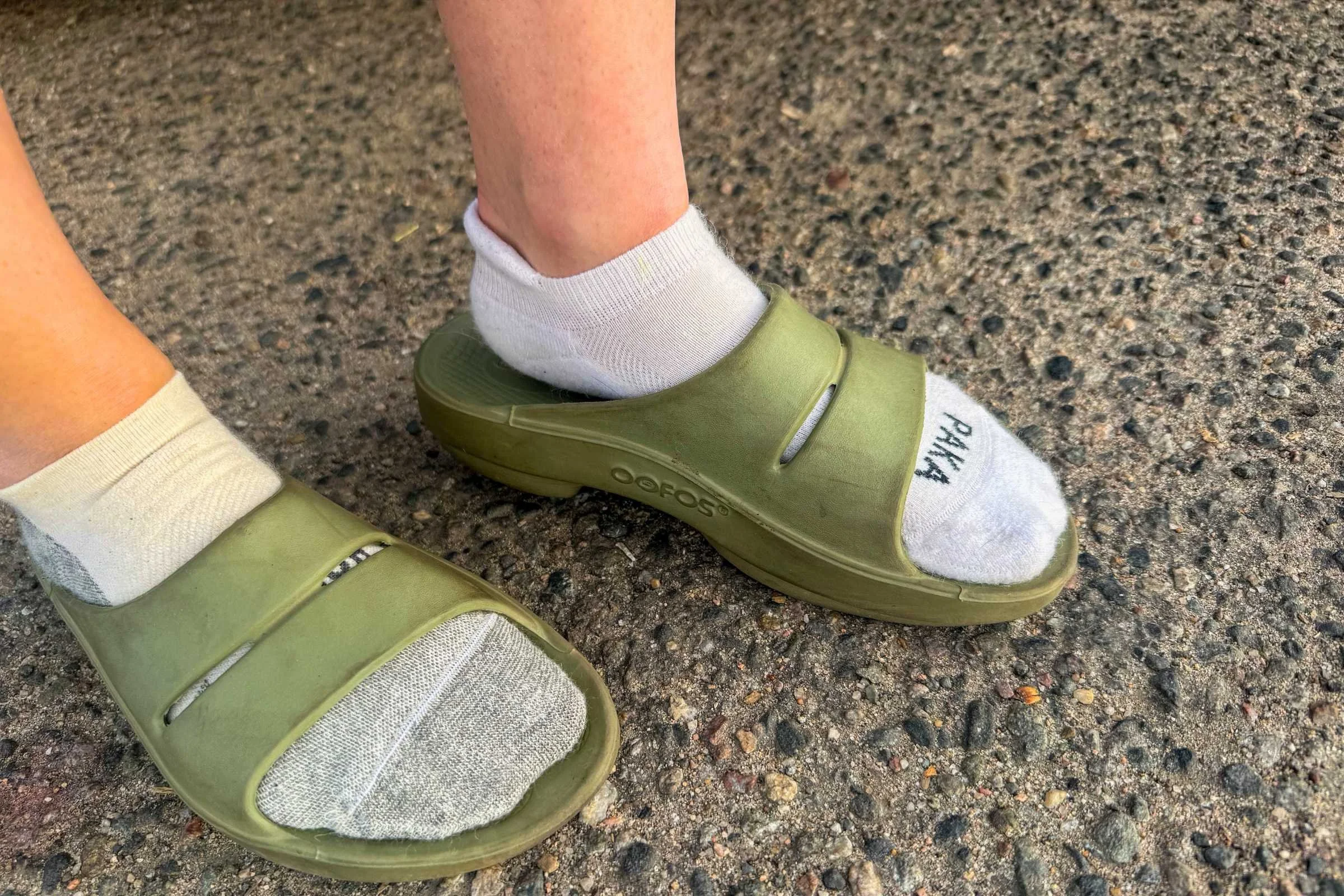 Detailed shot of the OOFOS OOahh slide highlighting its thick footbed.