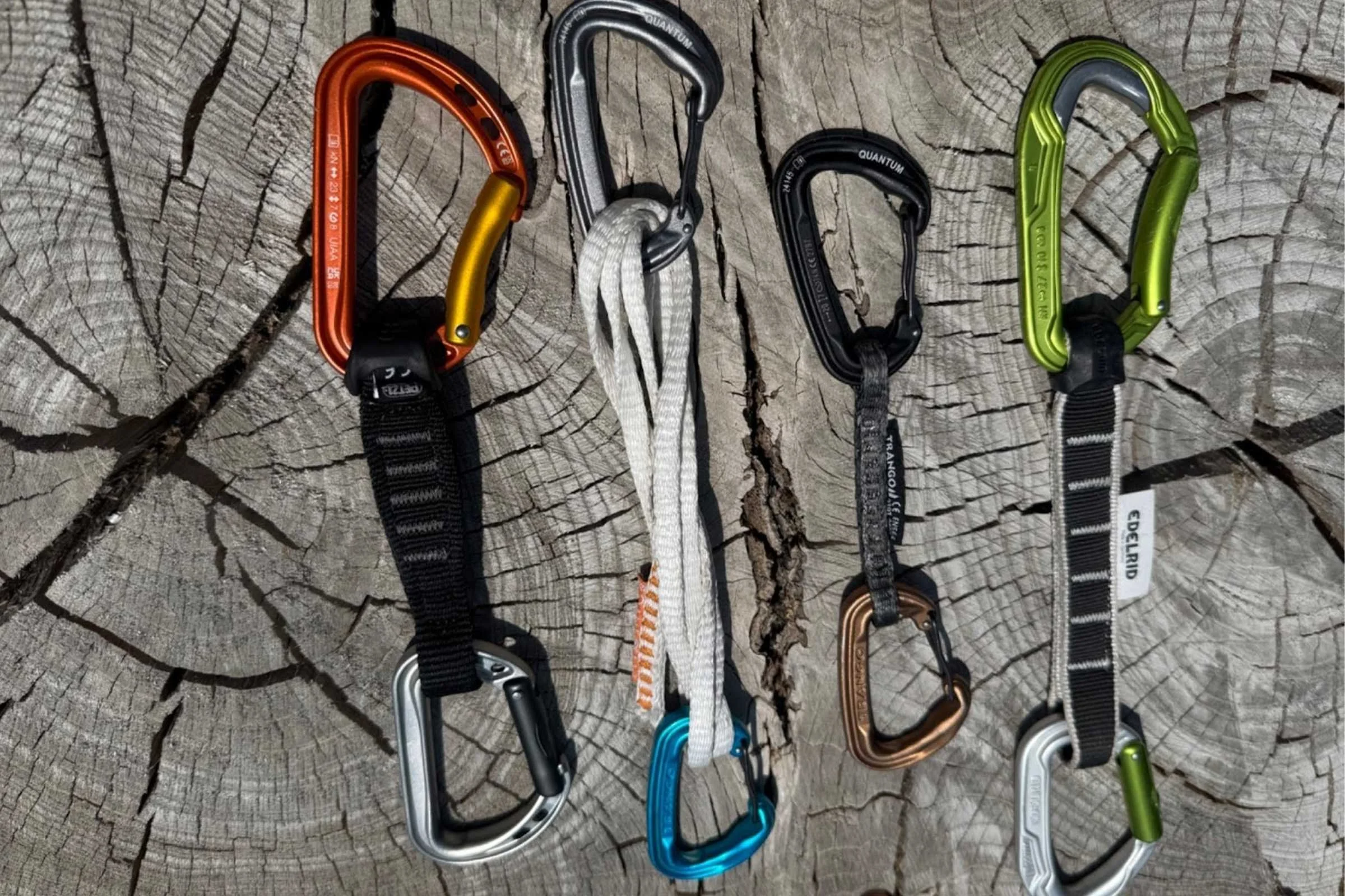 Comparison photo of four different quickdraw styles ranging from heavy sport to ultralight alpine.