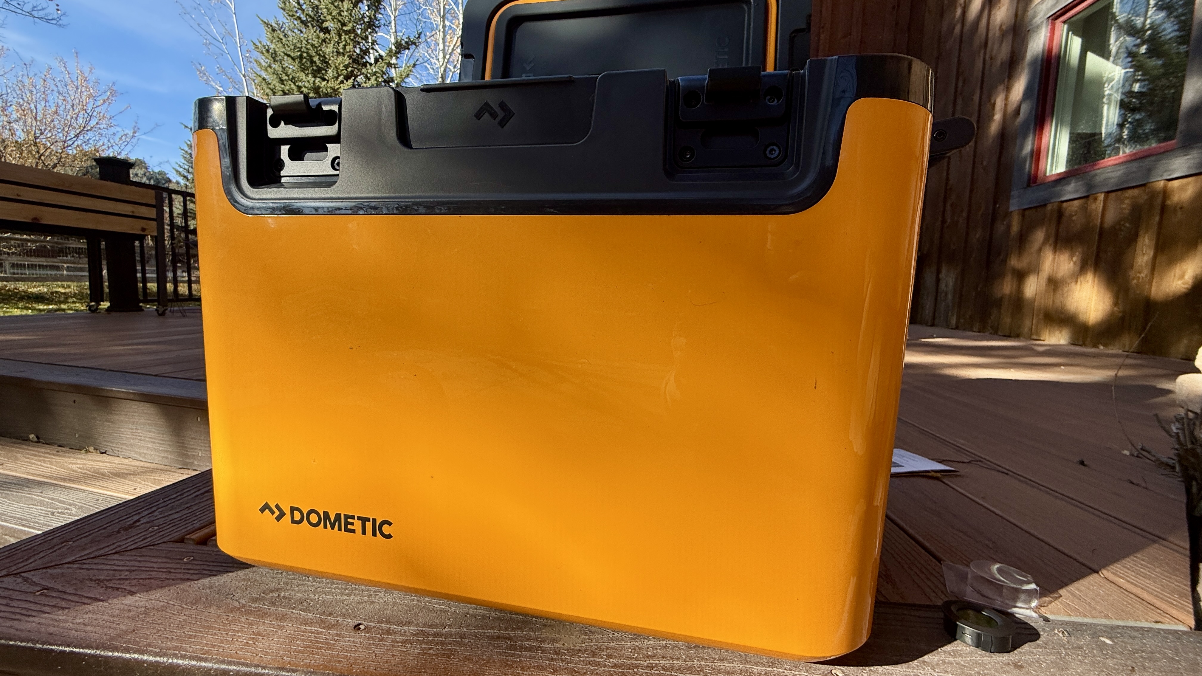 The Dometic Recon 41L hardsided cooler placed in a natural camping environment.