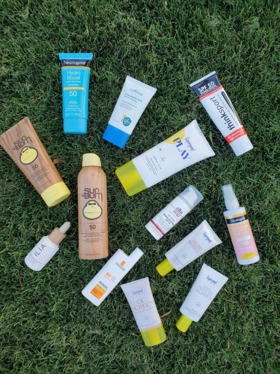 Side by side comparison of various sunscreen bottles being tested.