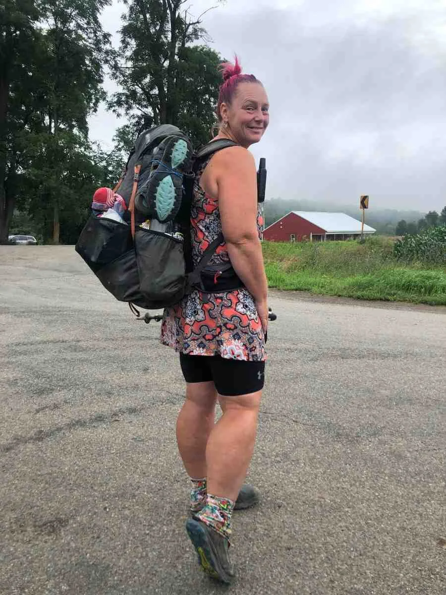 Hiker wearing shorts under a hiking dress to prevent skin-on-skin friction.