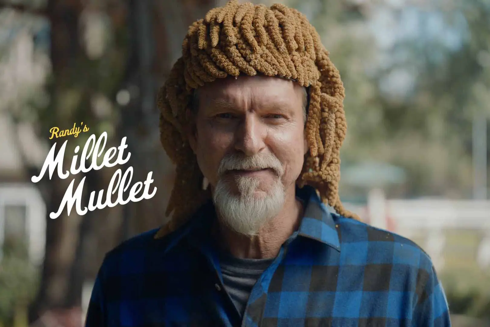 Randy Johnson with the Millet Mullet themed bird feeder accessory.