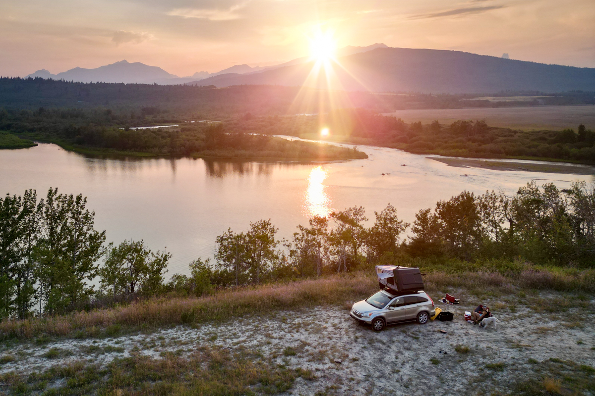 The Roofnest Condor 2 rooftop tent mounted on a vehicle in Glacier National Park.