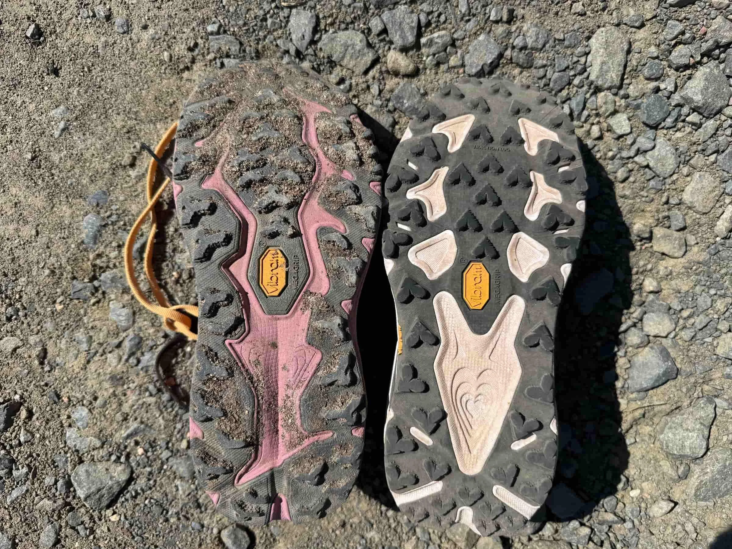 Side-by-side comparison of a worn-out Vibram Megagrip outsole next to a brand new one.