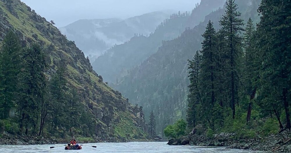Close up of whitewater current and hydraulics on a river mountain section.