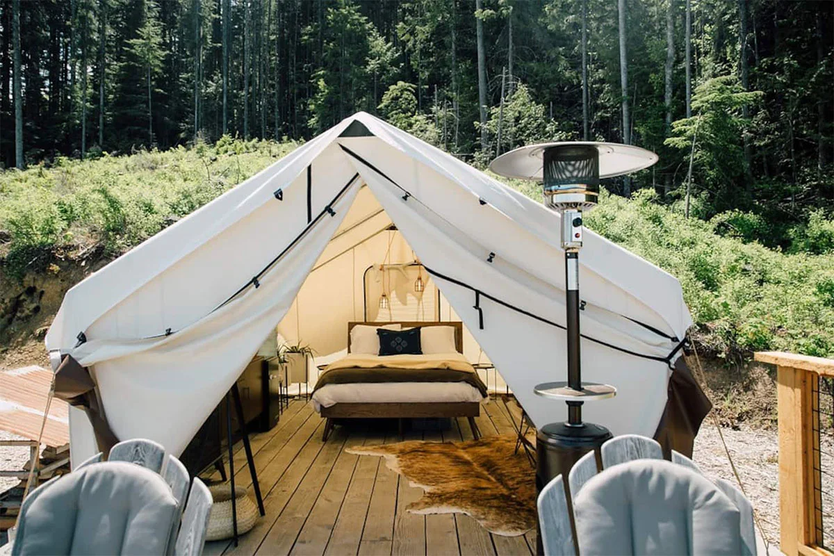 A luxury canvas tent setup in Port Angeles with a private deck.