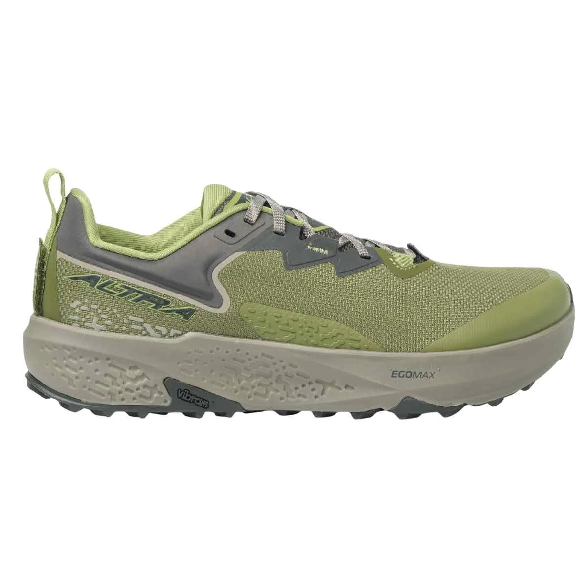 Close-up of a high-stack cushioned midsole being compressed on a rock.